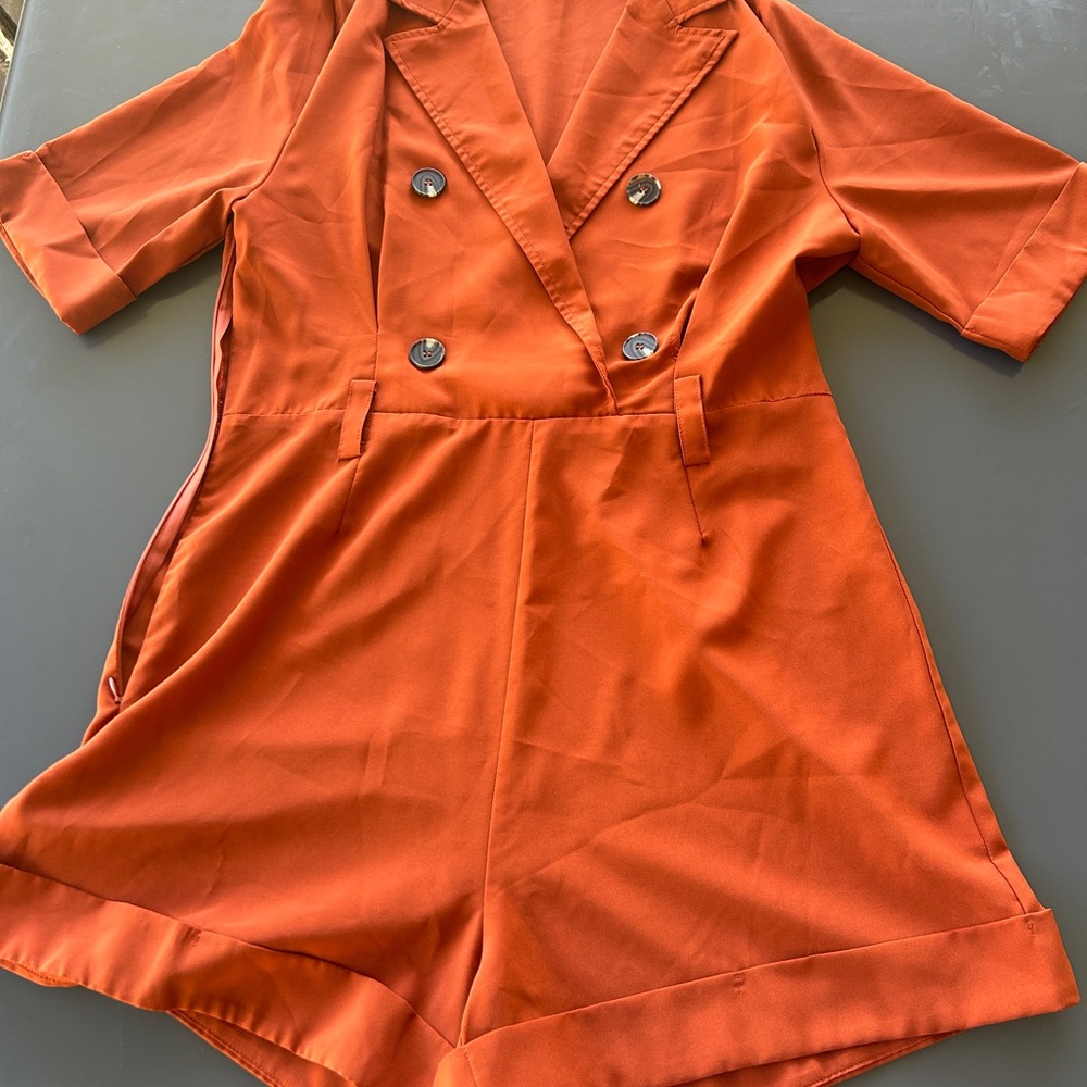 Chic Orange Double-Breasted Romper